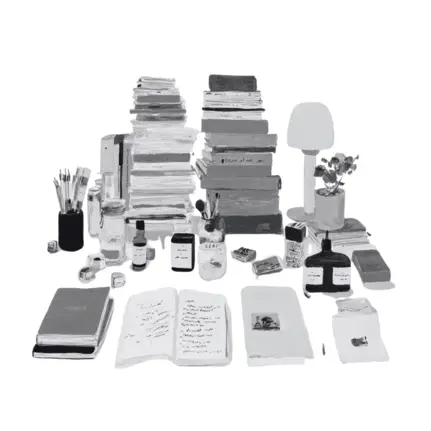 Books on top of desk with papers