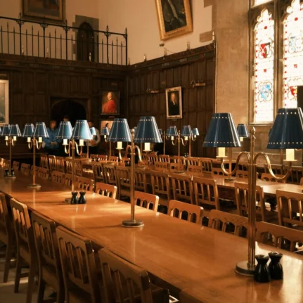 Dining tables inside an Oxbridge college dining hall