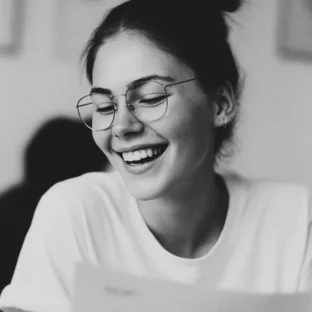 Smiling teen reading