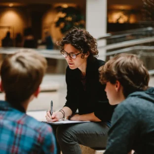 Tutor with two students Lionheart School