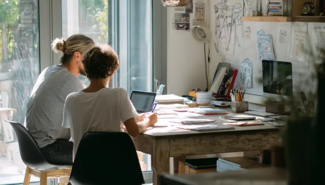 Teacher and student at desk at home, homeschooling for art lesson