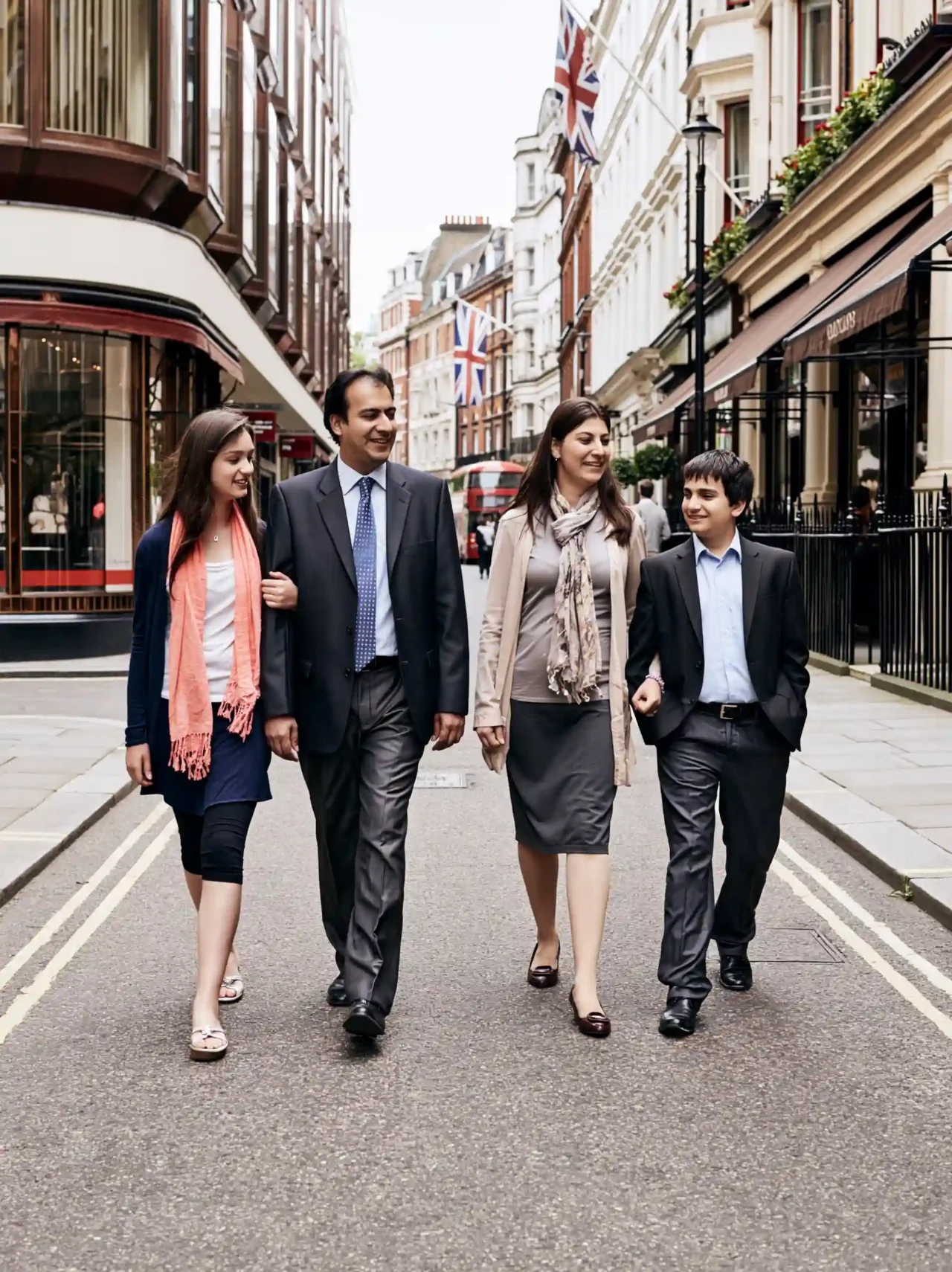 International south asian family walking through central london
